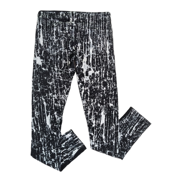 bebe Denim - Bebe Black/White Quinn Painted Legging Galazy wash  size 28